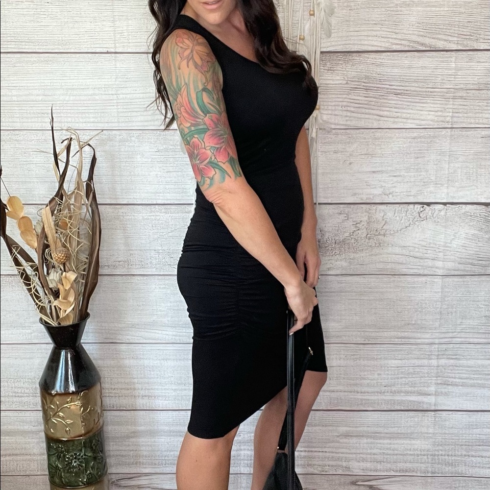 Stretchy, ruched little black dress